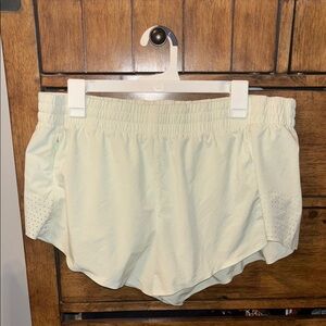 Athleta Cream Athletic Shorts with Relaxed Fit and Elastic Waistband